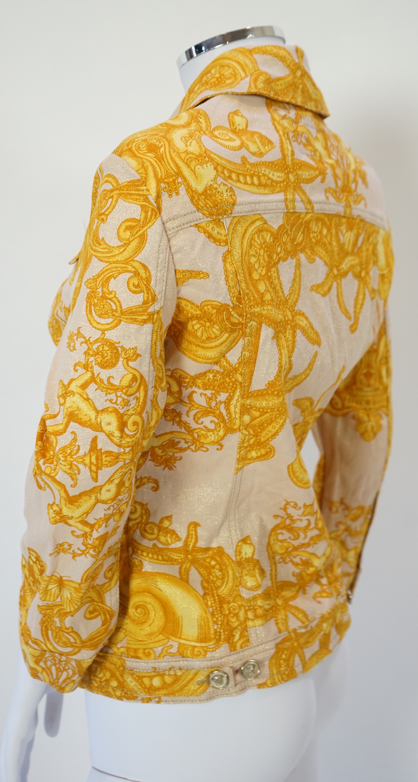 A Versace Collection green long dress and gold and yellow biker style jacket, dress size 52 and jacket size Medium